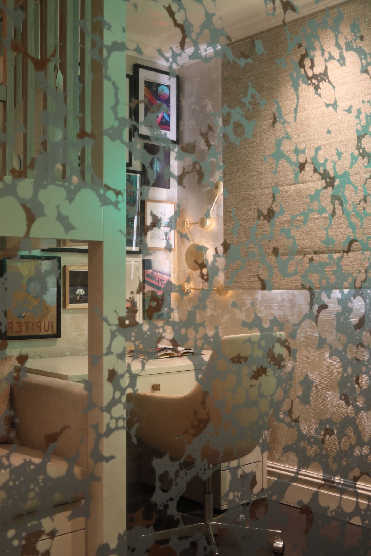 Bronze and gold verre églomisé reflective wardrobe doors.