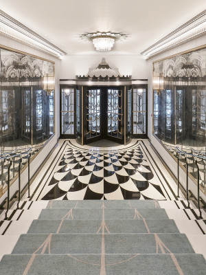 Verre églomisé installation either side of the Art Deco stairs at Claridge's, London.