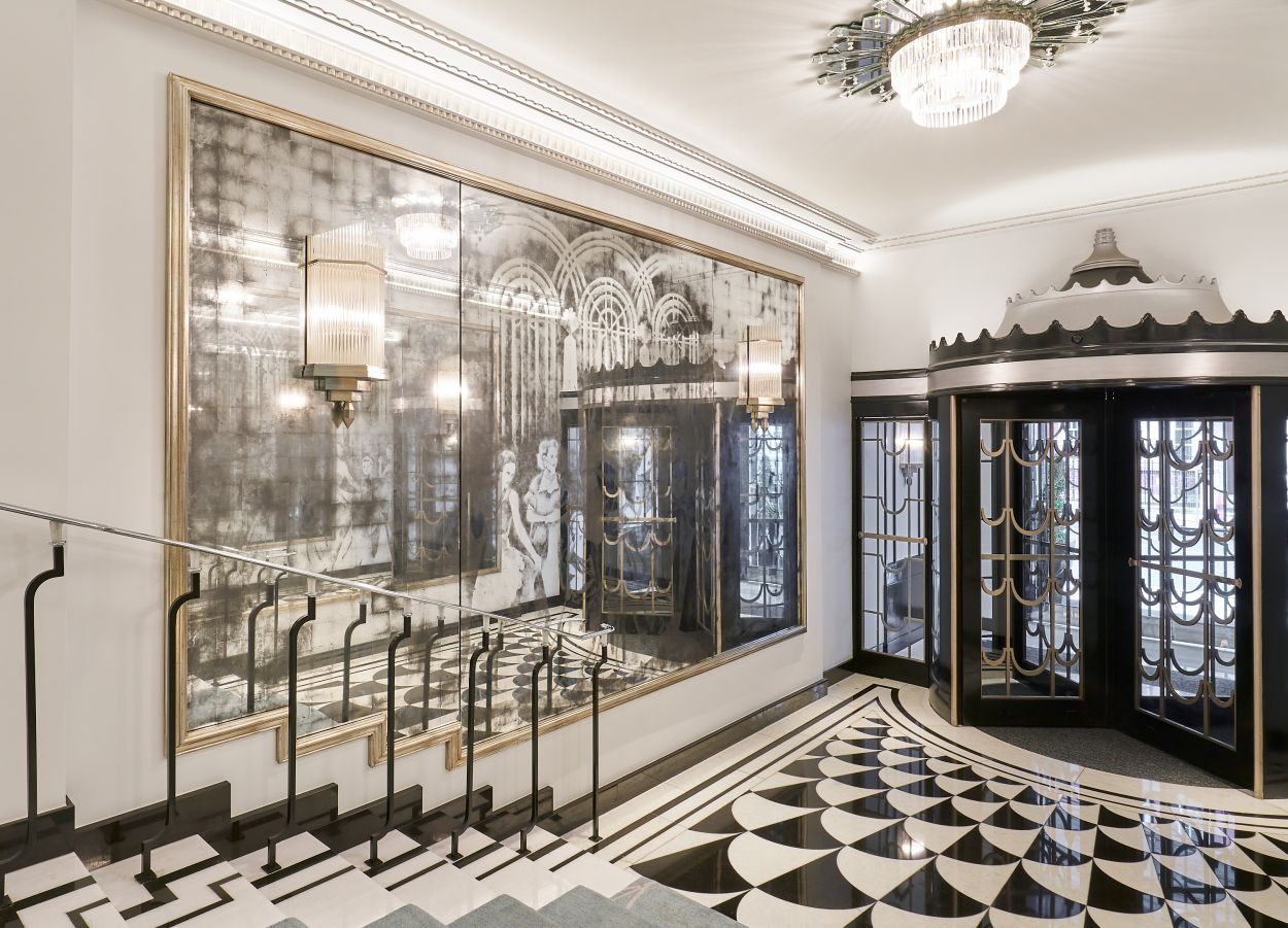 Verre églomisé installation next to the Art Deco stairs at Claridge's, London.