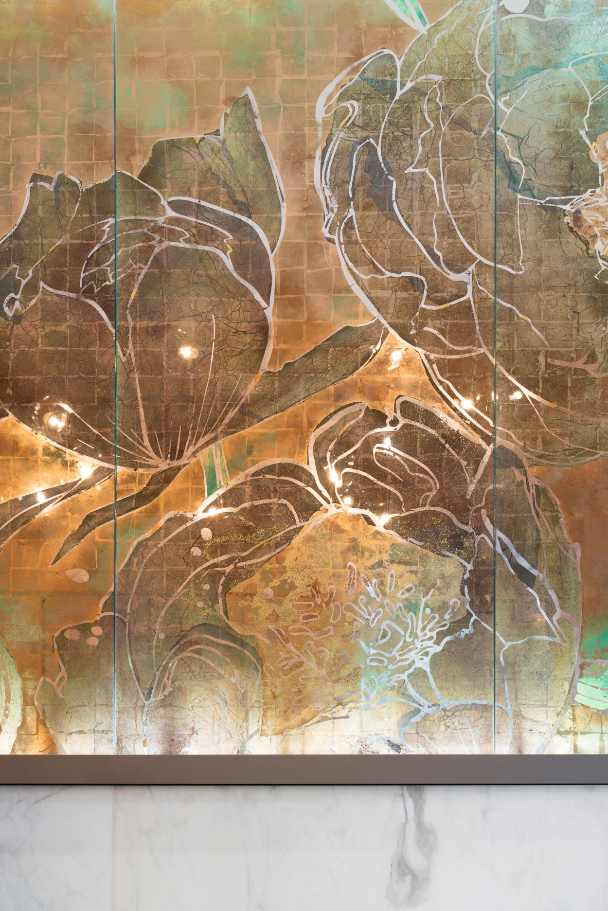 Detail of Peony verre églomisé artwork with 22 carat gold leaf and Japanese washi papers.
