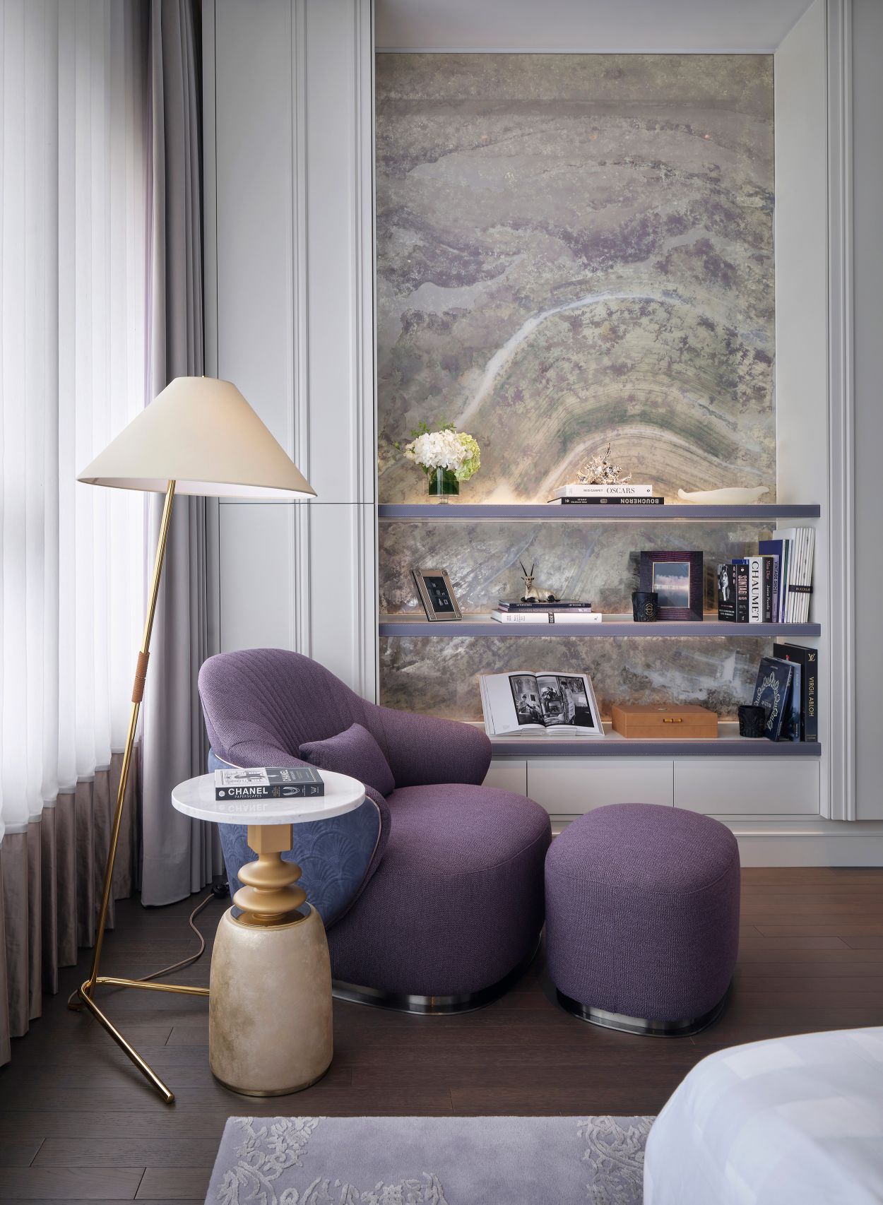 Lavendar and silver verre eglomise artwork in bedroom.