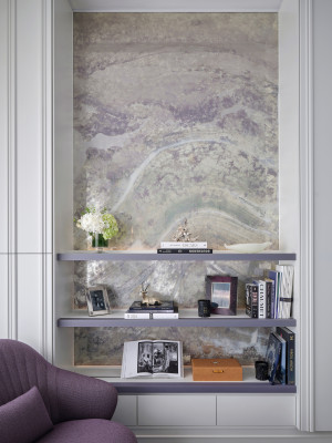 Verre eglomise artwork in bedroom niche.