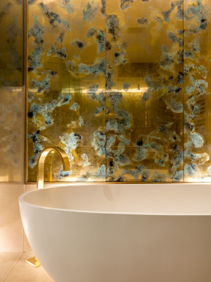 Verdigris and gold bathroom panels.