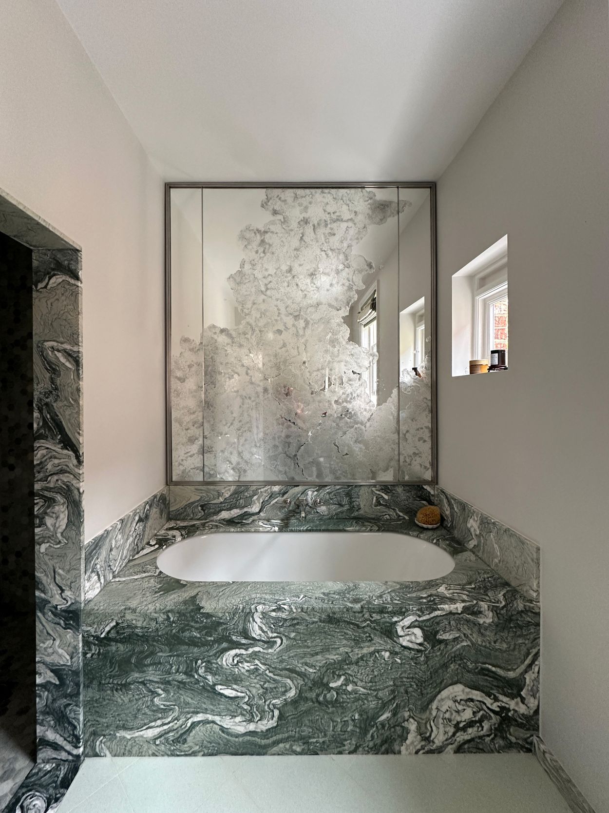 Plumes of Steam mirror for marble bathroom.