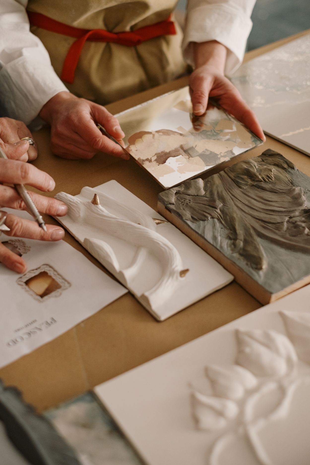 Bas relief and verre églomisé design process.