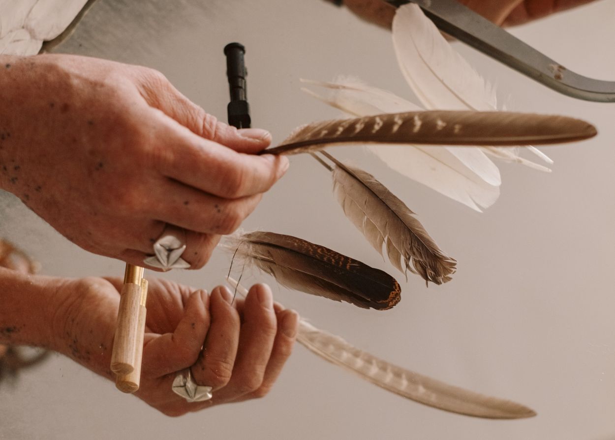 Owl and swan feathers.