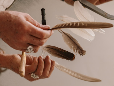 Owl and swan feathers.