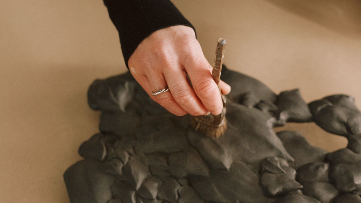 Bas relief sculpted reflector in the studio.