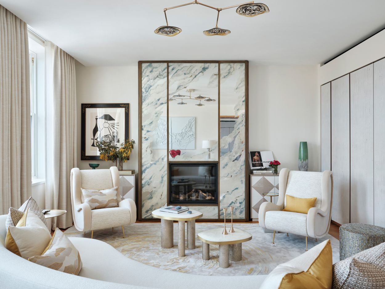 Silver verre eglomise fireplace at London apartment by Peascod.